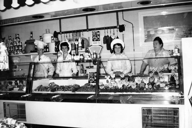 Dating back to 1962, this shows staff from the Sheffield and Ecclesall Co-operative Society Ltd behind the counter at the Weston Street branch