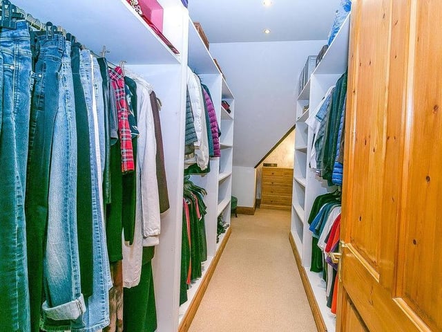 Now here's something you probably haven't got at home at the moment. A large, walk-in dressing room.