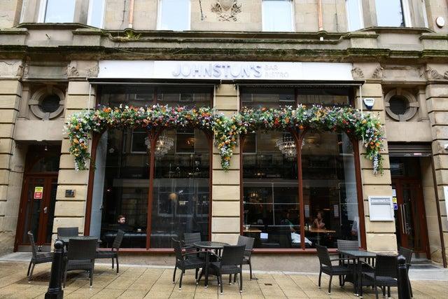 Johnston's was recommended by many of our readers as a top venue for a pint and some food.