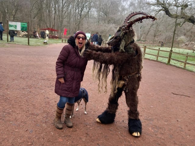 An unsuspecting dog walker encounters one of the terrifying Krampus creatures during the Spirits of the Forest and Wassailing weekend at Sherwood Forest