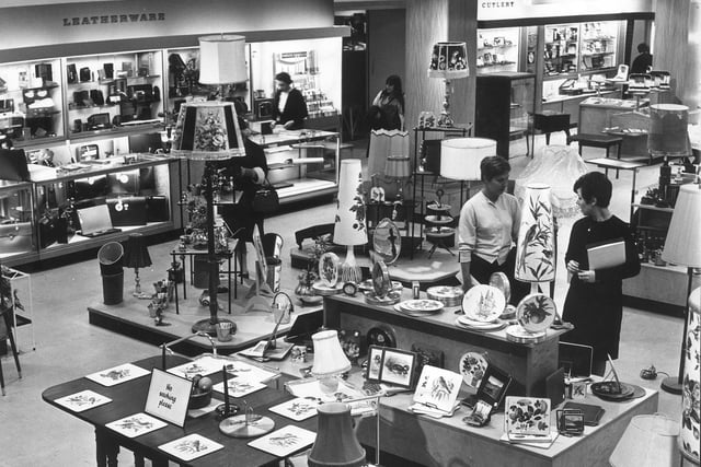Customers browse the goods on show in a new extension at Edinburgh's renowned Jenners department store in August 1967