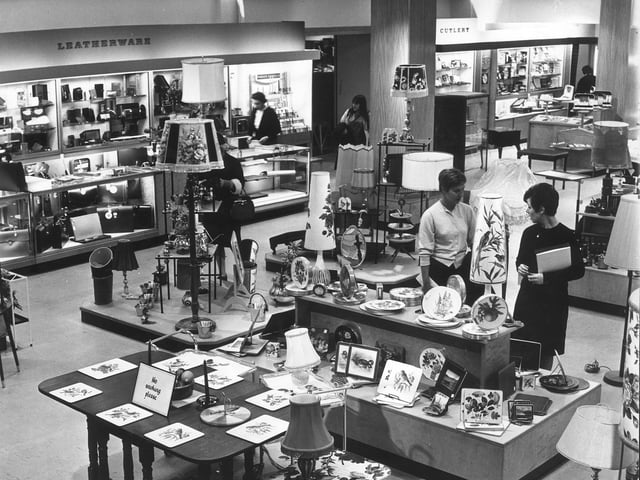 Customers browse the goods on show in a new extension at Edinburgh's renowned Jenners department store in August 1967