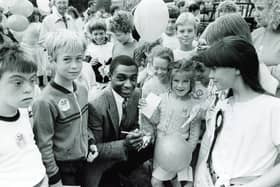 Herol 'Bomber' Graham signs autographs at the Junior Star Fun Day in 1987