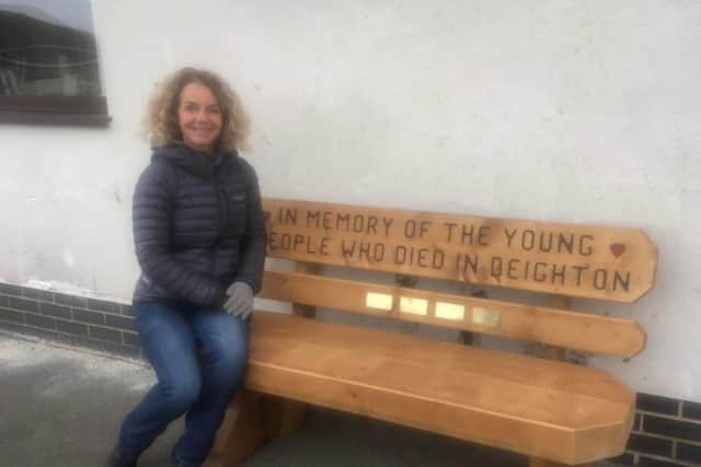Suzanne Lister on the memorial bench which is dedicated to her brother and other young people from Beighton, Sheffield, whose lives were cut short