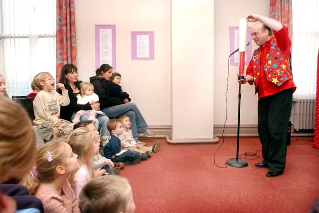 The Mr Olly magic show in full swing at Foggy Furze Library in 2005. Can you spot someone you know in the audience?