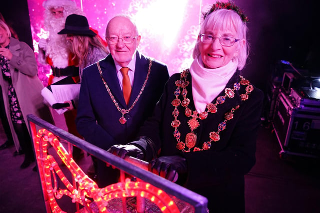 The Mayor of Chesterfield Coun Glenys Falconer and consort Keith Falconer switched the lights on