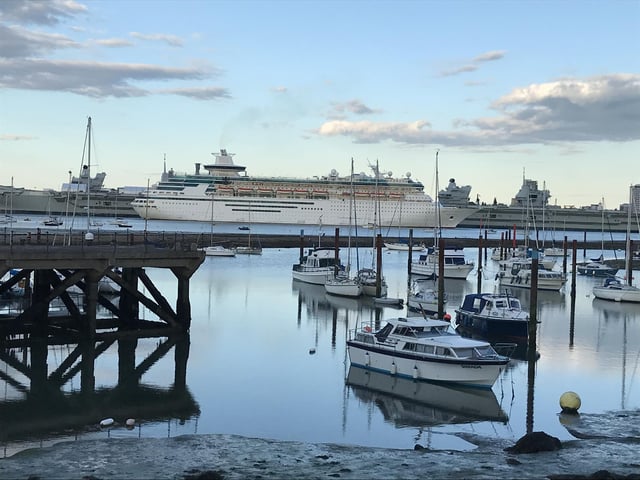 Majesty of the Seas with the two aircraft carriers behind her