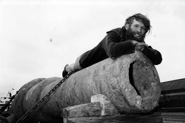 Nicholas Hall, Curator of the Artillery Fort Nelson, views the 38 ton, 1870s gun at the Wight Link Ferry after having transported it from Fort Albert, 1993. The News PP5721