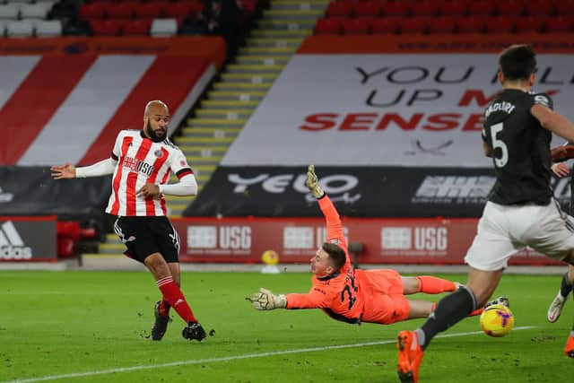 David McGoldrick of Sheffield Utd scoring his sides opening goal during the Premier League match at Bramall Lane, Sheffield. Picture date: 17th December 2020. Picture credit should read: Simon Bellis/Sportimage