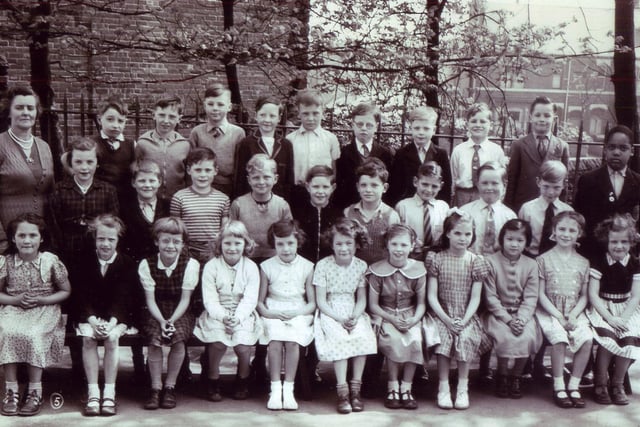 Firs Hill Junior School, Orphanage Row, Pitsmoor, Sheffield in 1958.  John Duckenfield is on the top row second from right and his twin sister, Ann Duckenfield is on the front row second from right