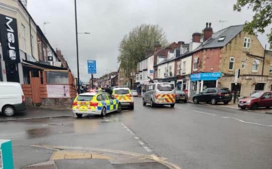 Police officers on Abbeydale Road, Sheffield, yesterday