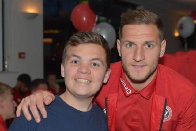 Reece Winterbottom with Sheffield United captain Billy Sharp