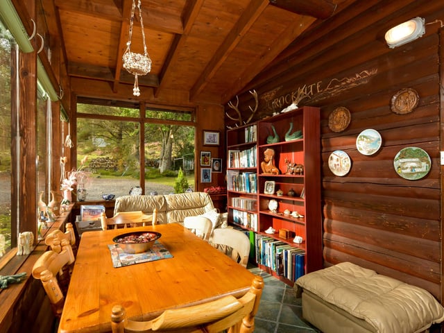 The sun room offers a great place to relax in the summer months