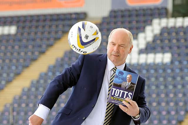 Alex Totten in 2015 at the Falkirk Stadium with his book Totts: From the Kop to the Kelpies, the Alex Totten Story. Photo: Michael Gillen