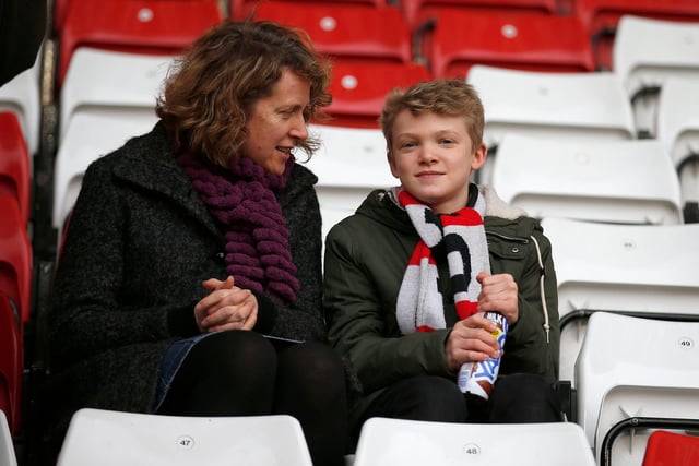 Two United supporters before the FA Cup second round tie with Oldham Athletic in December 2015.