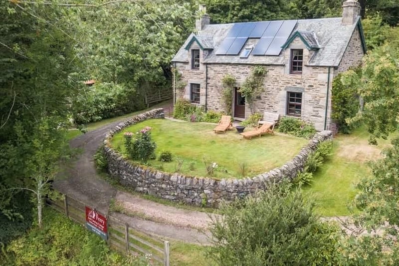 The River Tay has plentiful beautiful swimming spots and the Ferry House Cottage, near Aberfeldy, sits right on its banks.