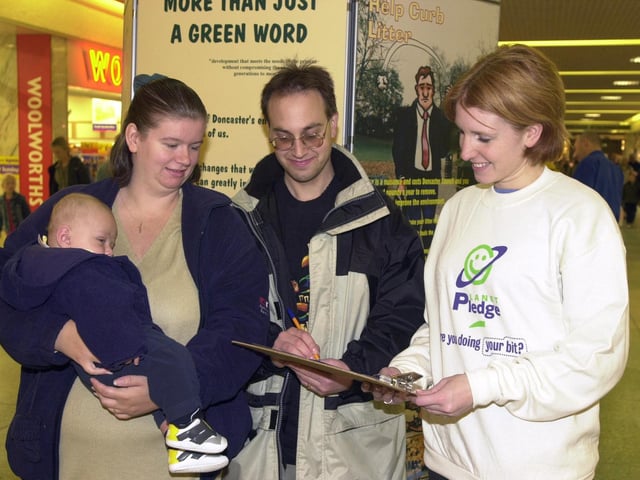 Helen Grant, of the Tidy Britain Group (right), chats to Amanda and David Chojnowski, of Hexthorpe, seen here with their four and a half month old son Joshua. Sustainability-More Than Just a Green Word, opened in the Frenchgate Centre  in 2000