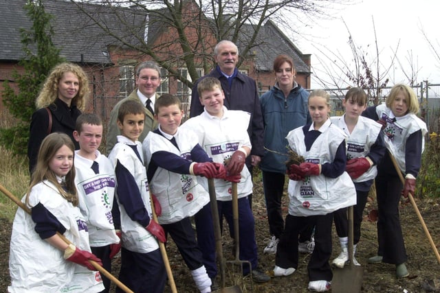 Pupils from Intake school, Cadman Road, Intake, Sheffield, out to tackle the overgrown allotments  next to their school. Seen are pupils who include,Georgina Brownett, Lawson Andrews, Joshua Burnham, Richard Martin , Alysha Brown, Amy Rawlinson,  Meg Kingswood, and Lewis Mason. With them LtoR are,  Sarah Watson consultant project manager from U-SCAPE, Kevan Hall President of the Sheffield Allotment Federation, Head teacher Neville Wheeler, and Kath Woodall Y6 teacher.