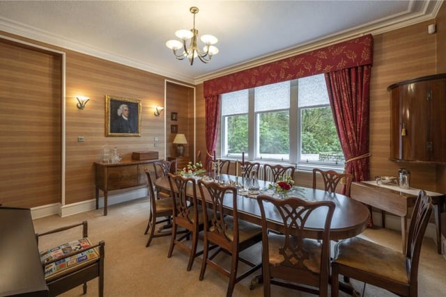 The well appointed dining room reflects the grand country house origins of the home with its handy butler's pantry.