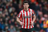 John Egan is expected to start for Sheffield United at Norwich City this weekend: Simon Bellis / Sportimage