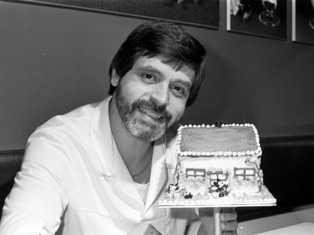 Lawrence Boni (of Mr Boni's Ice Cream Parlour) with the ice cream cake which won him second prize in an undisclosed competition in February 1983.