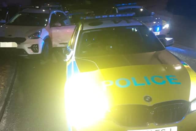 A driver was been arrested near Sheffield after driving the wrong way down the M1 and ramming a police car.