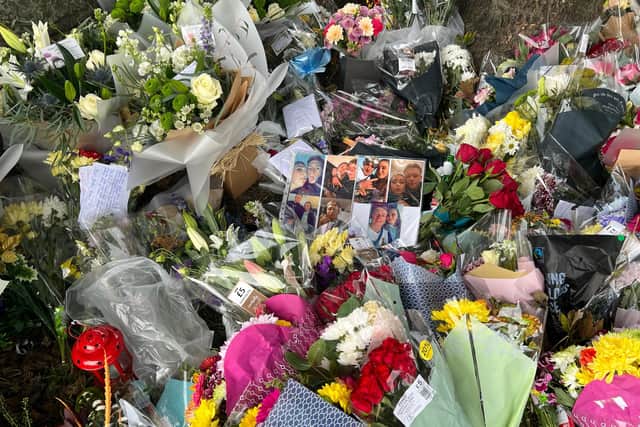 Flowers, balloons, notes and pictures have all been left at the scene of a car crash in Kiveton Park, Rotherham, which happened on Sunday.
