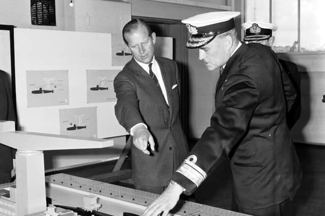 Rear-Admiral Ridley explained submarine reactors to  Prince Philip, Duke of Edinburgh, when he visited Rosyth Dockyard in October 1967