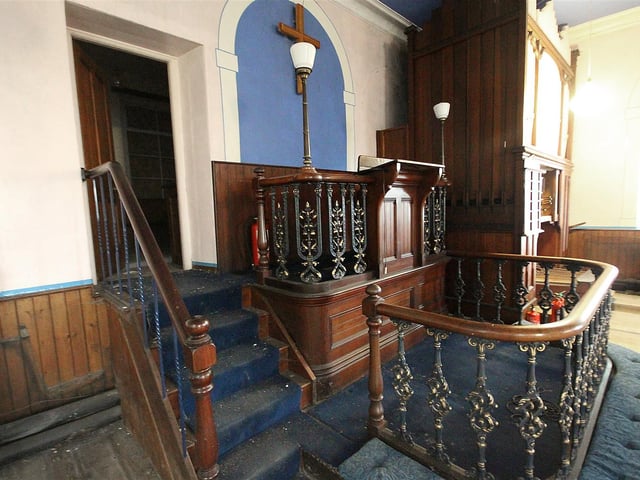Here's a closer look at the pulpit, where services would have been led for decades.