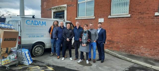 Pictured, left to right, are Steve Szaflicki and Cain Green from Cadam, Mark McKnight from the Hope Centre, Jason Collins from Cadam, volunteer Max Rose, Colin Davies from Hope Community Foundation and Wayne Fletcher
