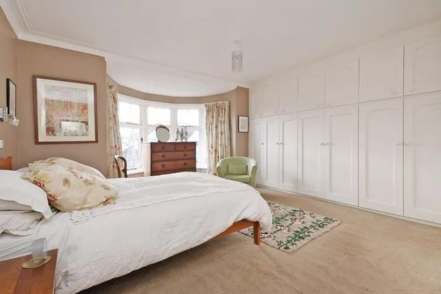 There are two front facing bedrooms, the master bedroom has a bay window with lovely views and a huge range of solid wooden built in wardrobes.