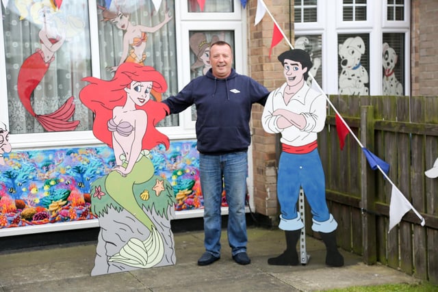 Headland resident Peter Sutheran has brought lots of joy with his cartoon cut outs in Lumley Square for several years. Here he is in 2017.