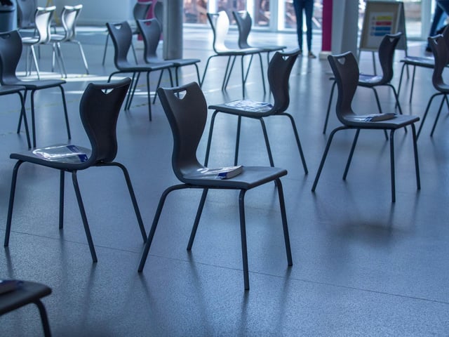 Masks placed on chairs for students and visitors at Portsmouth College. Picture: Habibur Rahman