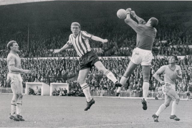 Mick Jones unsettles the Aston Villa 'keeper in August 1965.