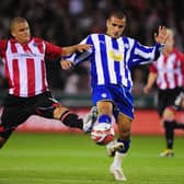 STEEL CITY SON: Kyle Walker tackles Wednesday's Marcus Tudgay in a Sheffield Wednesday at Bramall Lane in 2009