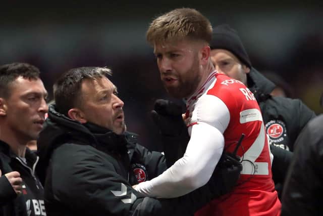 Fleetwood Town's Shaun Rooney reacts as he leaves the pitch after being shown a red card against Sheffield Wednesday. (Barrington Coombs/PA Wire)