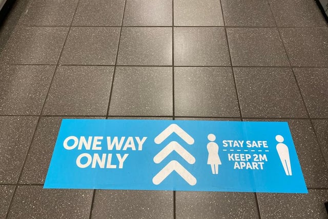 Many stores will have one-way direction arrows in place, making sure that customers navigate themselves around the shop in one-way (Photo: Shutterstock)