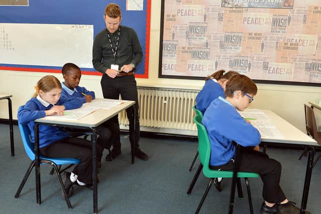 At Charnock Hall Academy, pupils are always sat next to the same person in lesson to minimise the potential spread of Covid-19