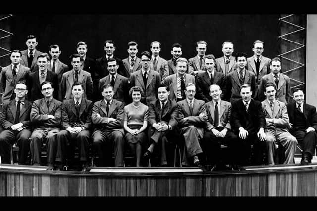 Staff of the Mechanical Working Division - Don Spenceley says he's on the back row with a melancholy look on his face