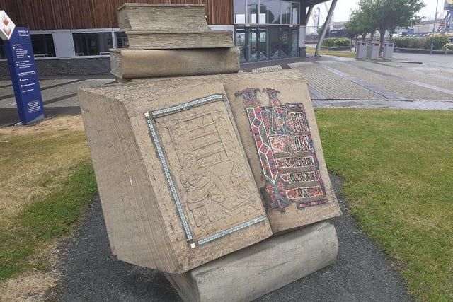 Where is this beautiful sculpture of an ancient text?