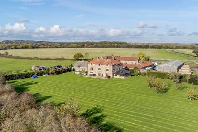 A drone shot of the £895,000 Warsop Cottage Farm, which dates back to the 17th century but has been extensively renovated. The photo shows the huge expanse of land (almost five acres) on which the house sits.