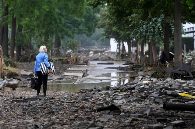 The death toll from devastating floods in Europe soared to at least 93, most of them in western Germany, where emergency responders were searching for hundreds of missing people. (Photo by Christof STACHE / AFP)