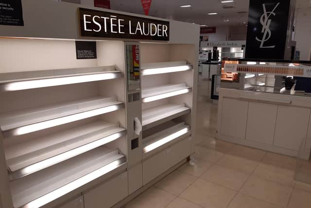 The Estee Lauder section has been cleared out.