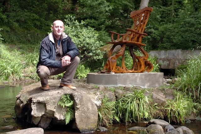 Artist Jason Thomson with his sculpture of a marooned chair in the River Rivelin at Rivelin Valley, June 23, 2011