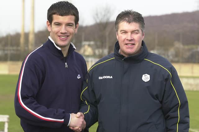 Brian Barry-Murphy is welcomed to Hillsborough by manager Chris Turner back in January 2003.