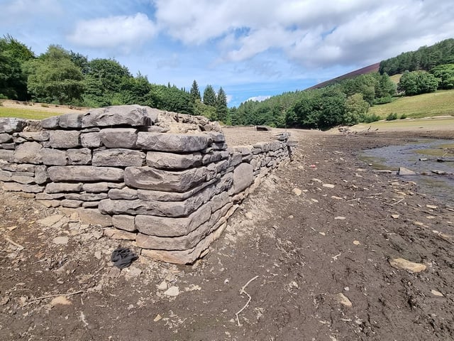 Another of the buildings which has emerged after water levels at Ladybower Reservoir fell dramatically