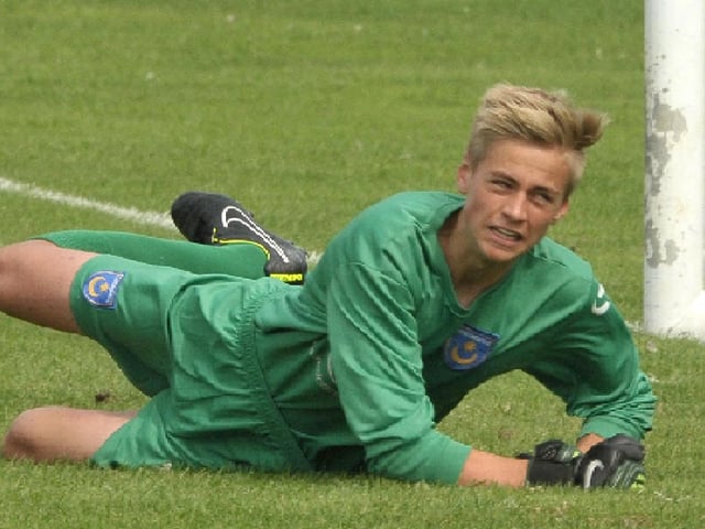 A 16-year-old Bass in action for Pompey Academy in 2014.