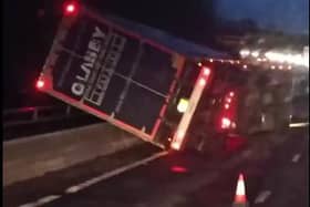 A lorry toppled over on the A1, near Doncaster, during Storm Eunice yesterday