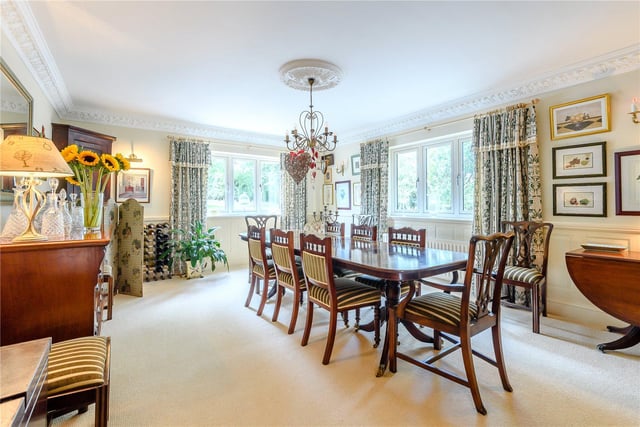 The dual-aspect dining room is generous in size to provide plenty of space for family dining and entertaining, while offering views overlooking the garden.