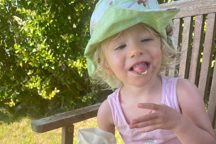 Gracie enjoying an ice cream.